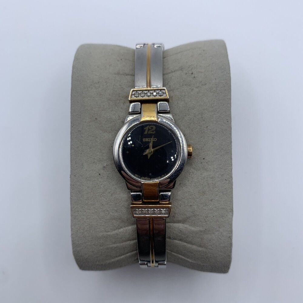 Seiko Silver Tone Womens 1N00-OGM0 Watch Dark Blue Dial Gold